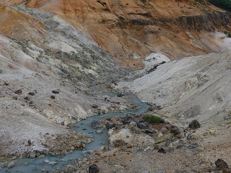 jigokudani hell valley hot spring red rock