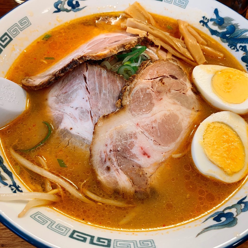 A bowl of ramen with pork and boiled eggs at Tozanken in Niseko.